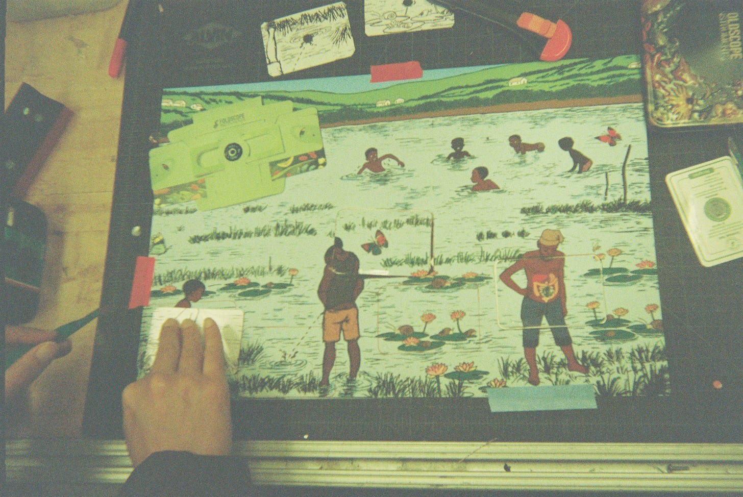 A close look through a Foldscope at a sample embedded in the puzzle